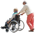 Elderly man pushing his wife in a wheelchair on a sunny day - human png - miniature